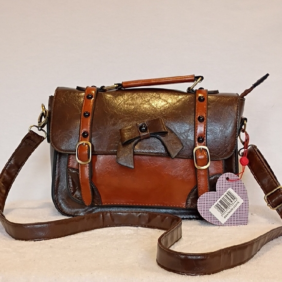 Banned Apparel Handbags - NWT Banned Apparel Cross Body Purse Equestrian Satchel 2 Toned Leather Buckle